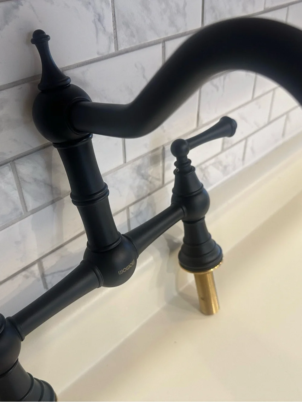 Matte Black Bridge Kitchen Faucet with Brass Accent